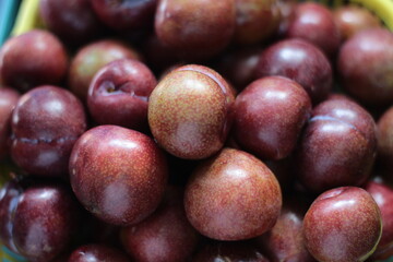 Fototapeta premium red Plum on a market
