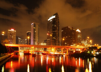 Fototapeta na wymiar downtown, night, cityscape, tampa, florida, illuminated, urban, long exposure, skyscraper, city, water