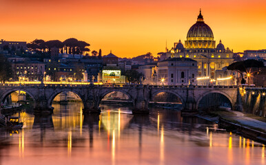 Fototapeta na wymiar Saint Peter Cathedral and Tiber river at sunset.