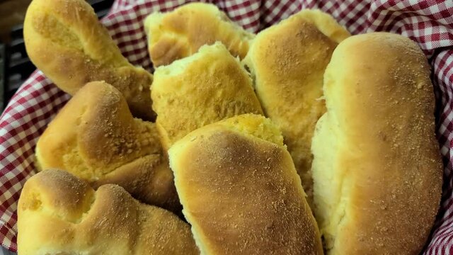 newly baked spanish bread in a basket container