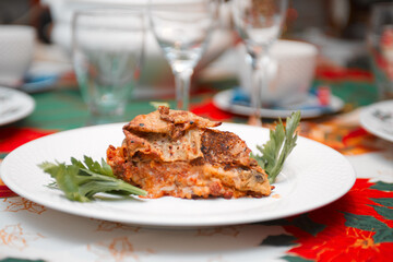 Close up of timballo slice on a dish