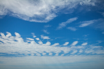 Beautiful white cotton-like clouds. White cloud cumulus. Water in the form of steam in the sky