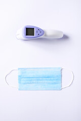 Infrared thermometer and surgical mask