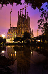 Fototapeta na wymiar Sagrada Familia church at twilight in a rainy day. Barcelona, Spain.