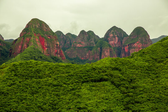 Pristine Red Rock Mountain Range Covered of Forest of Amboro National park, Bolivia on a Cloudy Day