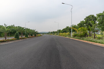 Fototapeta na wymiar Perspective view of wide asphalt road