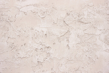 Fototapeta premium rough plaster surface, empty light vintage background