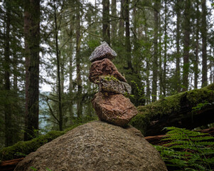 Pyramid of stones , balancing stones in forest of British Columbia.