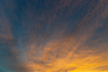 Dramatic sky with clouds at sunset