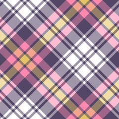 Tartan plaid pattern colorful background. Seamless diagonal check plaid graphic in purple, pink, yellow, and white for scarf, flannel shirt, blanket, throw, or other fabric design.