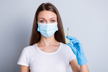 Closeup photo of lady family doctor hospital examination raise arm prepare syringe dose patient vaccine injecting treatment therapy wear protect face mask isolated grey color background