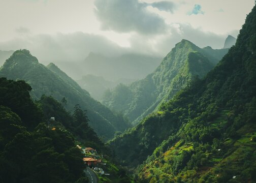 Mesmerizing scenery of green  mountains with cloudy sky background