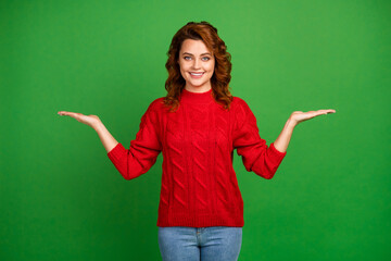 Portrait of positive cheerful girl hold hand present adverts recommend select promo wear good look...