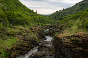 winding river along a green valley