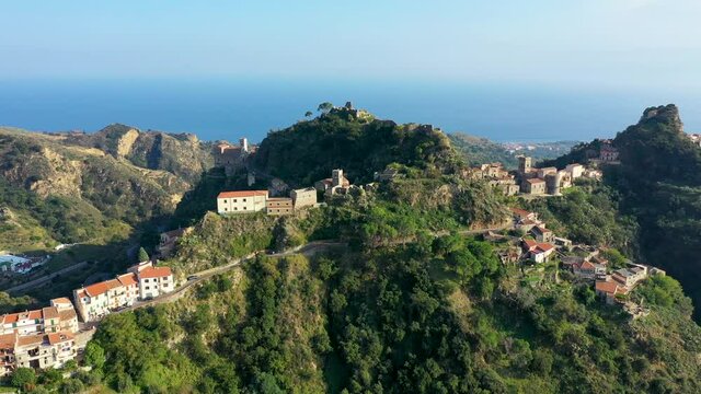 Aerial view of Savoca village in Sicily, Italy. Sicilian village Savoca (known from the Godfather movies). Houses on a hill in Savoca, small town on Sicily in Italy.
