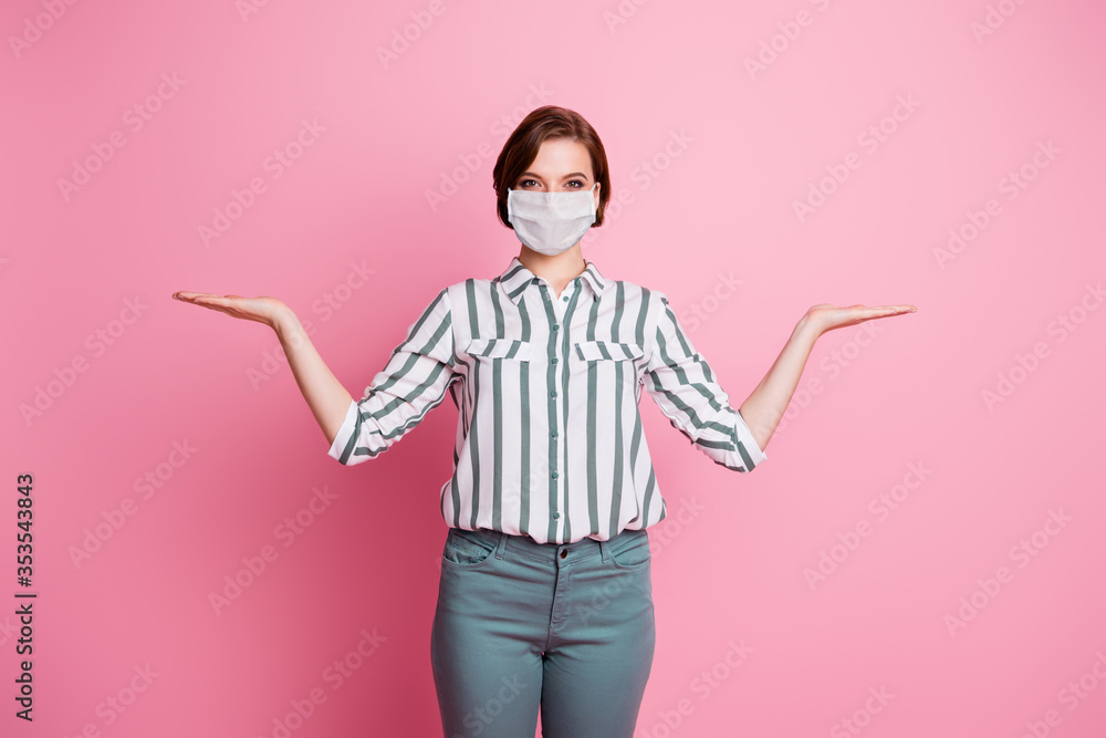 Sticker Portrait of her she attractive pretty content girl wearing gauze mask holding copy space on palms decontamination concept prevention disease isolated over pink pastel color background