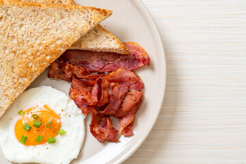 fried egg with bread toasted and bacon