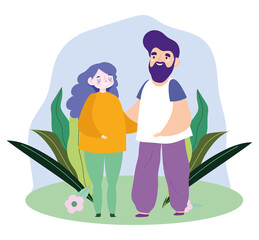 bearded father and mother together in the grass, family day