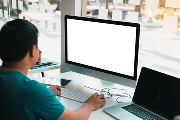 Man using computer blank screen in the modern office.