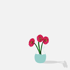 3 beautiful flowers in blue vase