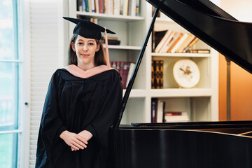 young woman in graduation cap and gown