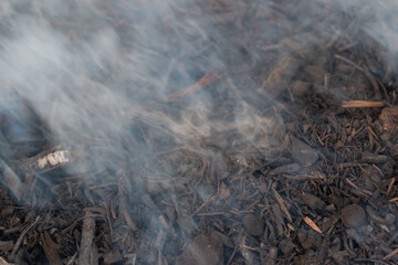 gray smoke on coals as a background
