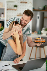 Wife's birthday. Husband surprise his wife with birthday cake