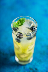 Blueberry cocktail with kiwi fruit. Selective focus. Shallow depth of field.