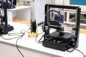3D printer. Making plastic parts. Modern production technology.