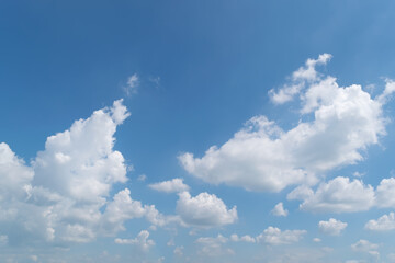 Naklejka na ściany i meble Beautiful cloudscape on blue sky background.