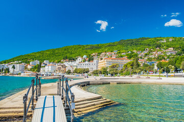 Croatia, beautiful Opatija riviera on Kvarner, popular beach Slatina and pedestrian bridge in scenic tourist resorts