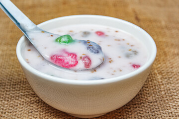 Flour boiled in coconut milk topping with sesame (Krong Krang.
