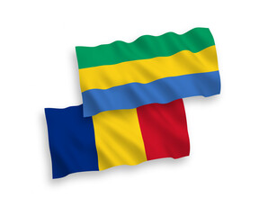 Flags of Romania and Gabon on a white background