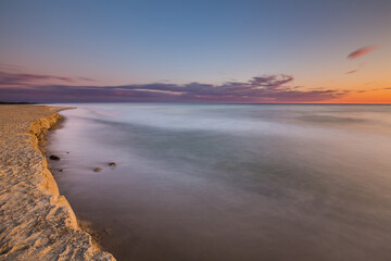 Travel photography of the Baltic sea coastline.Amazing sunrise over the Sea. Jastrzebia Gora, Poland.