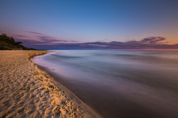 Travel photography of the Baltic sea coastline.Amazing sunrise over the Sea. Jastrzebia Gora, Poland.