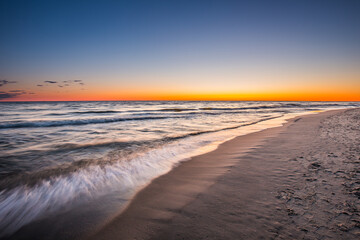 Travel photography of the Baltic sea coastline.Amazing sunrise over the Sea. Jastrzebia Gora, Poland.