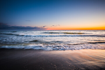 Travel photography of the Baltic sea coastline.Amazing sunrise over the Sea. Jastrzebia Gora, Poland.