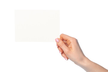 Woman's hand holding blank white sheet of paper isolated on white