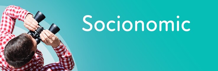 Fototapeta premium Socionomic. Businessman (man) looks through binoculars. Birds eye view. Focus on text. Blue Background. Business, Finance, Statistics, Analysis, Economy