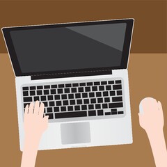 Hand using laptop and mouse