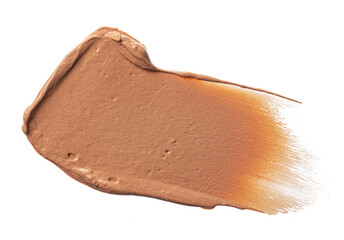 Smudged stain of a cream foundation isolated on white