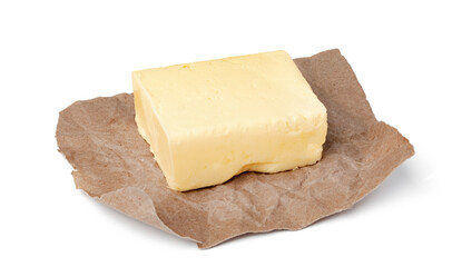 Fresh butter on craft paper isolated on white background
