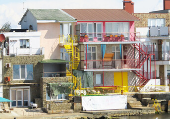 View from the boathouse to the beach and sea in the Crimea in Theodosius Bay