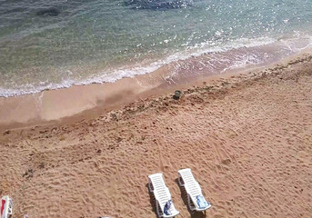 View from the boathouse to the beach and sea in the Crimea in Theodosius Bay