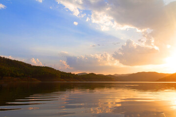 Fototapeta premium Colorful sky and colorful water in lake reflected in evening 
