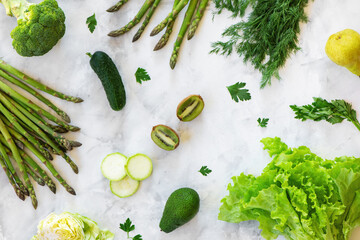 Fruits and vegetables on marble background.