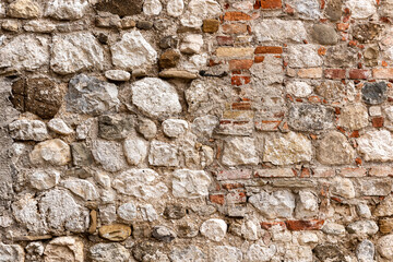 Original Bricks and stone wall handcrafted and antique