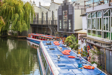 Fototapeta na wymiar Canal tour boat waterbus at Camden market in London