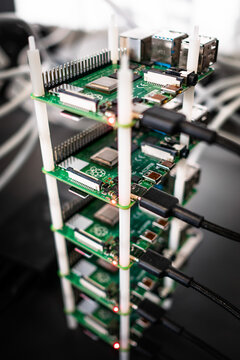 Cluster of Raspberry Pi 4 board. The Raspberry Pi is a credit-card-sized single-board computer. Conencted together as a cluster they can produce as much computation as a single laptop.
