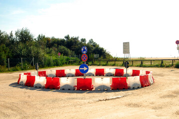 Roundabout sign and direction arrow